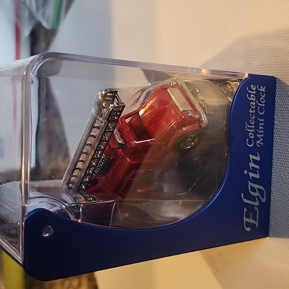 Elgin collectible mini clock fire engine needs battery sold as is . Great piece - Picture 3 of 5
